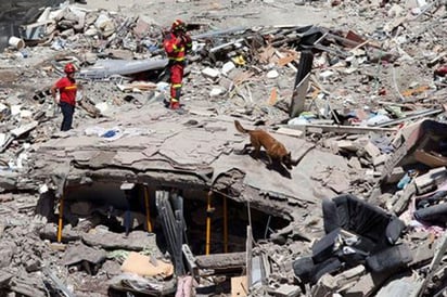 Colapso de edificio deja dos muertos