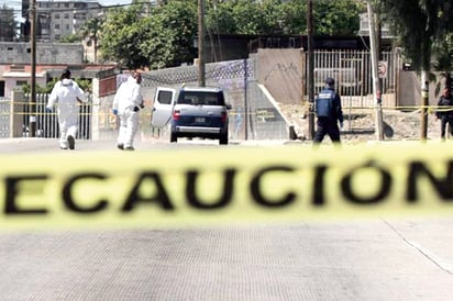 Encuentran muerto a hijo de mando policiaco