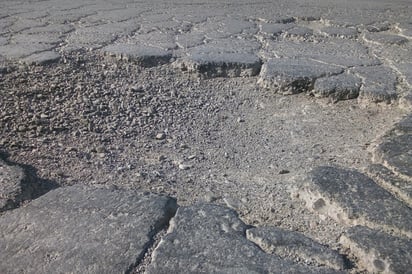 Reconoce Obras públicas la existencia de baches