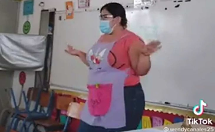 Maestra cambia 'El candadito' para promover el cubrebocas