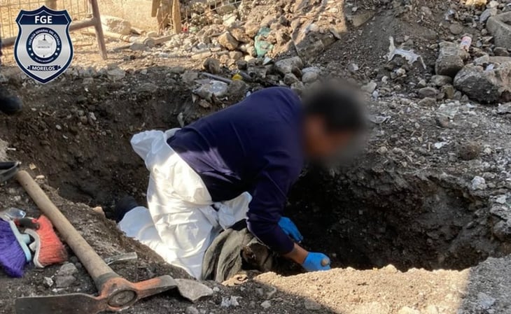 Catean casas en Morelos y hallan cuerpo en fosa clandestina