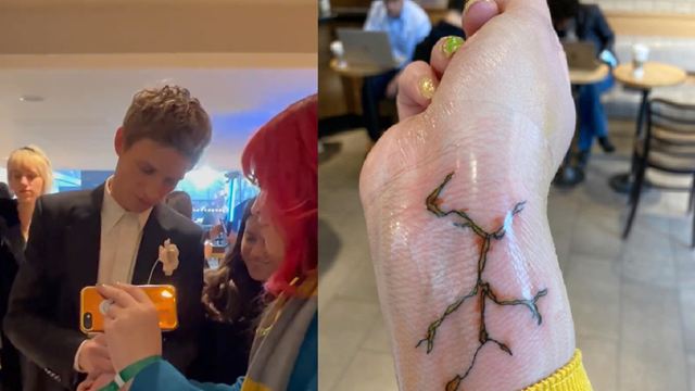 Fan mexicana logra que Eddie Redmayne le haga un tatuaje en la premiere de 'Animales Fantásticos 3'