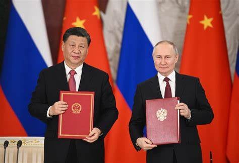 China y Rusia firman 14 documentos de asociación integral