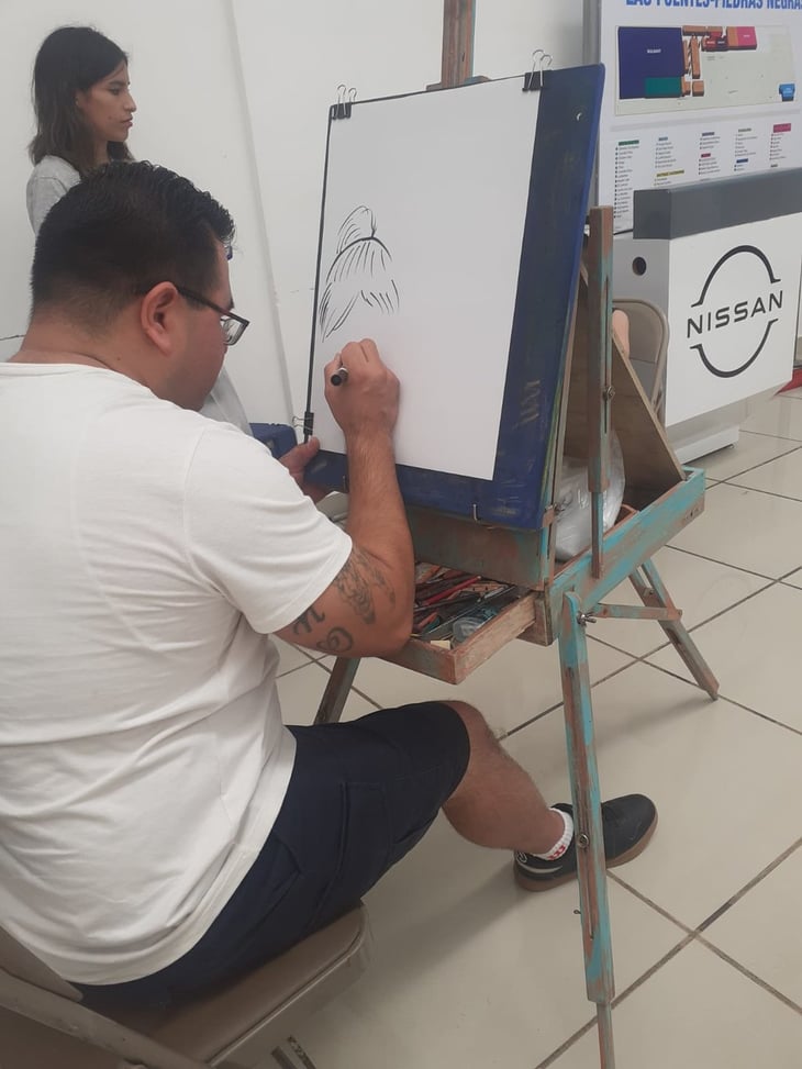 Caricaturista michoacano comparte su talento con los nigropetenses