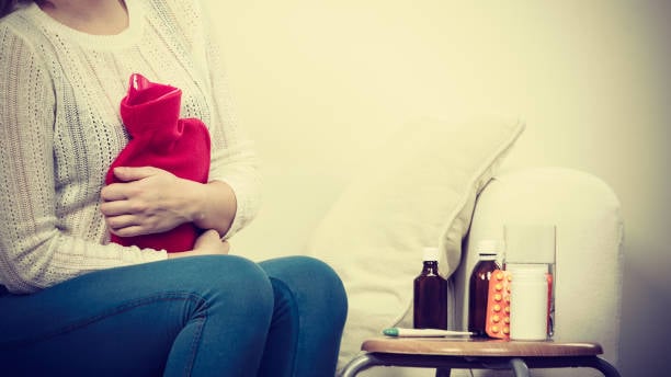 ¿Es normal tener síntomas de gripe antes de la menstruación?