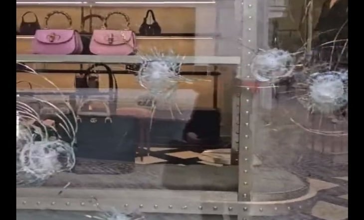 Ambientalistas rompen escaparate de una tienda Gucci en Lisboa