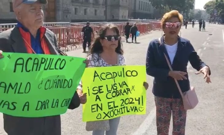 Con pancartas de 'Xóchitl Va', esperan en Palacio Nacional llegada de caravana de Acapulco