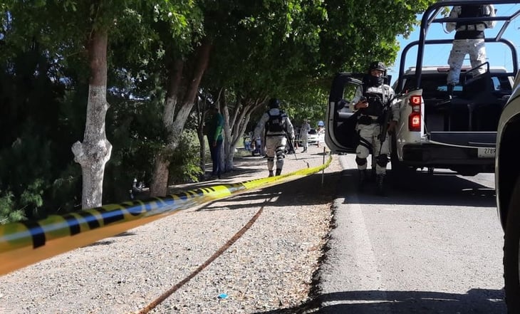 Policías hallan cuerpo de elemento de la Guardia Nacional en canal de Culiacán