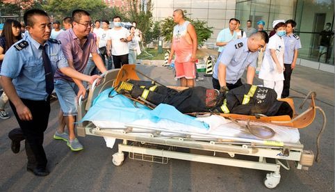 Suman 39 los muertos por el incendio de un edificio en China