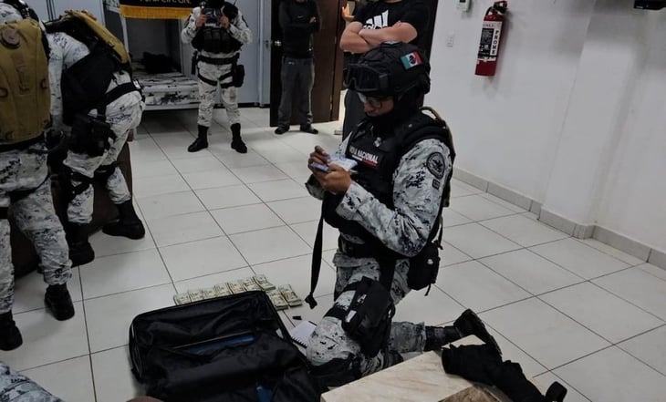 Hallan en cuartel de la GN 48 mil dólares en efectivo y armas sin registrar