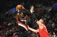 Triple de Vucevic antes de la bocina da a los Bulls victoria 122-121 sobre los Blazers