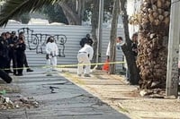 Hallan cuerpo embolsado afuera del Bachilleres 10 en CDMX