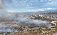 Tras más de cinco horas, controlan incendio en Bordo de Xochiaca