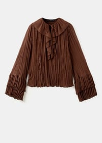 5 blusas elegantes para llevar a la oficina en la temporada febrero 2026