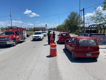 Bomberos  instalan  filtros y dan  cubrebocas