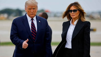 Melania Trump dice que tiene 'síntomas leves' de COVID-19 y se siente 'bien'