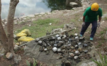 CFE investiga hallazgo de medidores de luz en cenote de Yucatán