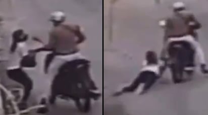 VIDEO: Asaltante en moto arrastra a mujer varios metros para robarle su bolsa: A pesar del fuerte dolor, la víctima logró evitar el asalto