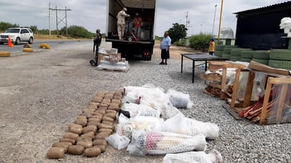 Asegura SEDENA 26 kilos de marihuana en Piedras Negras: marihuana, SEDENA, Nuevo Laredo, camión de paquetería