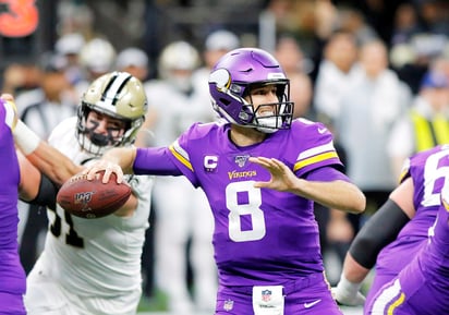 Kirk Cousins lanzó dos pases de anotación en el triunfo de los Vikings