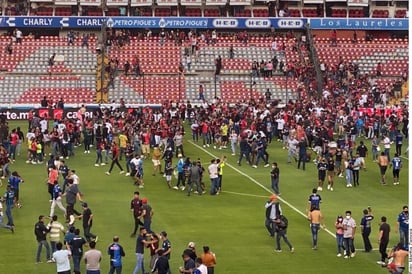 Sube a 26 cifra de heridos tras riña en estadio de fútbol 