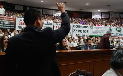 Dimite el diputado conservador que miró porno en el Parlamento