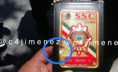 Policía recibe un balazo y lo salva su placa de la SSC