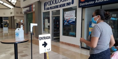 Comerciantes se   procupan por casos  Covid en sus negocios