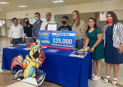 21 K Mva presentó al creador de la mascota oficial