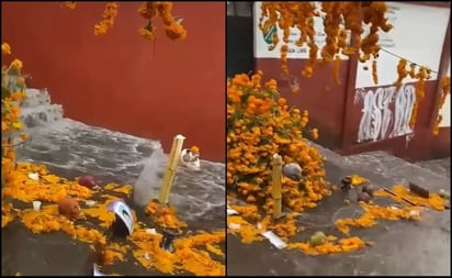 VIDEO: En 15 minutos, lluvia arrastra el altar de muertos más grande de Michoacán