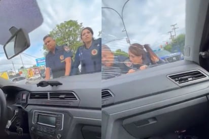 Automovilista arrastra a par de policías que lo detuvieron