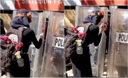 VIDEO: Con flor y beso en la mano, feminista agradece a policías en marcha del 8M;se viraliza en TikTok: Por medio de redes sociales, un usuario difundió el video donde se ve a una mujer encapuchada y con mochila acercarse a policías