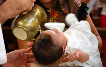 México aún continúa con la norma de llevar padrinos de bautizo