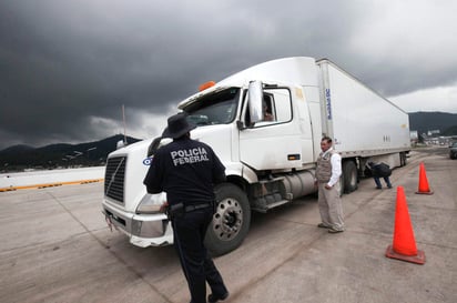 Transportistas entre robos y restricciones para asegurarse