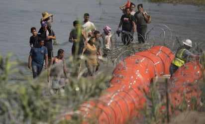 Localizan otro cuerpo sin vida en muro de boyas alambradas colocado en el Río Bravo