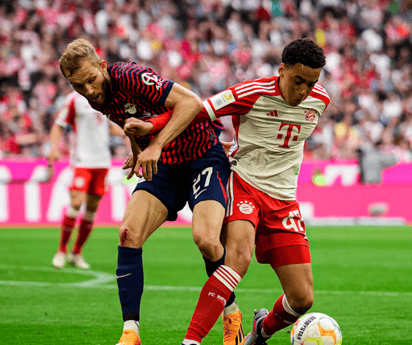 Dani Olmo asestó un triplete para arruinar el debut de Kane y dar al Leipzig la Supercopa