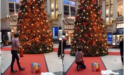 Activistas pintan de naranja árboles navideños en Alemania