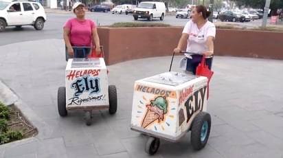 Desafían altas temperaturas para vender paletas y nieve