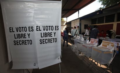 Líderes empresariales hacen largas filas para votar