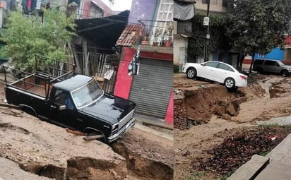 'Alberto' provoca socavón en Veracruz y caen dos autos 