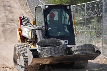 Región : Este año, el Gobierno de Texas reforzó la valla de púas sobre el río Bravo e incrementó el número de soldados 