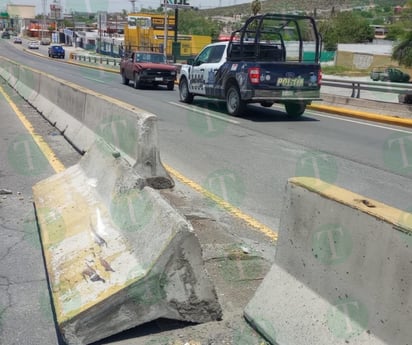 Policiaca : El impacto fue tan fuerte que derribó parte del muro