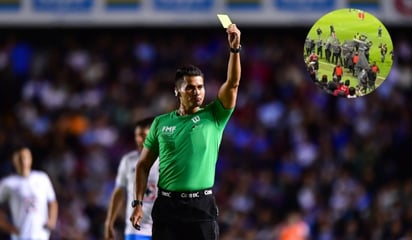 deportes: El árbitro Guillermo Pacheco tuvo que ser escoltado por la seguridad del estadio para abandonar la cancha el Nemesio Diez