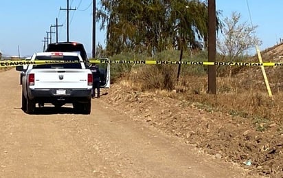 Ejecución: El hombre tenía las manos atadas y una aparente herida en la cabeza.