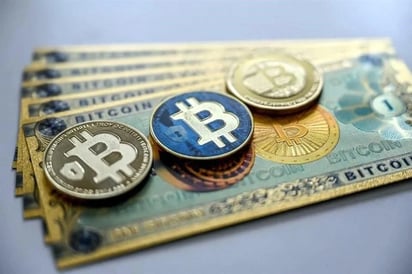 Economía: En diciembre, el bitcoin alcanzó un máximo de 108 mil 316 dólares