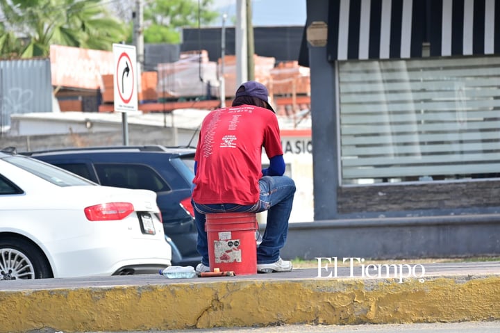 Galería fotográfica: Cuando el calor no detiene la lucha diaria en las calles