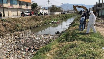 Hallan restos humanos en canal de Ecatepec; colectivo denuncia fosa clandestina