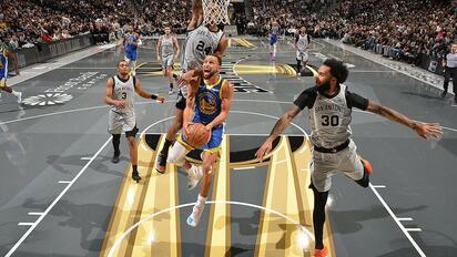Los Warriors vencen a los Spurs con un Curry de récord