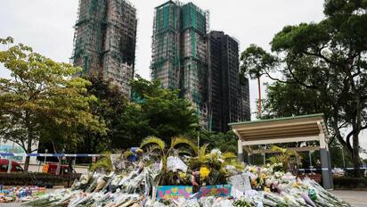 Sube a 13 el número de detenidos por el incendio en Hong Kong; van 151 muertos