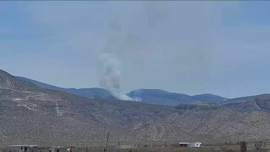 Lluvia y descenso de temperatura ayudan a sofocar incendio en el Cerro de la Gloria